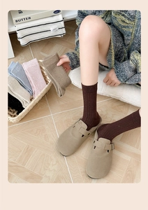 Texture détaillée de tricot de chaussettes en coton vintage aux points colorés