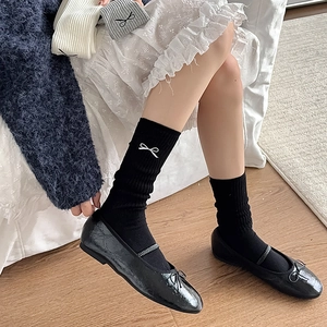 Japanese style black cotton crew socks with white bow embroidery and mary jane shoes