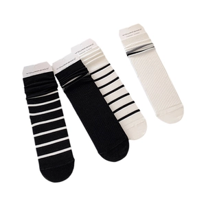 Set of four premium white and black striped cotton mid-calf socks for women