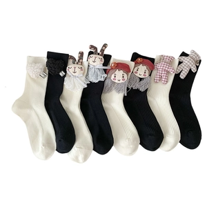 Cute cotton crew socks for women featuring 3D cartoon dolls and plush heart decorations