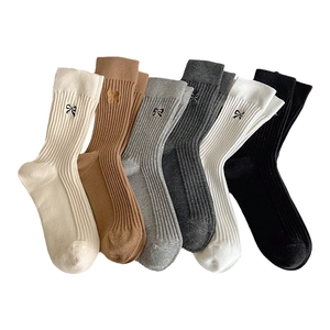 Ribbed cotton mid-calf socks for women featuring elegant bow embroidery in 6 assorted colors