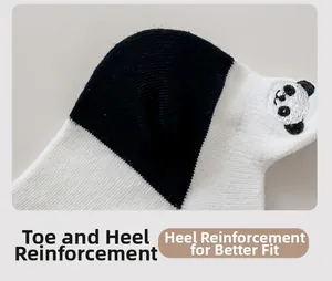 Detail of reinforced black heel on white cotton socks with cute panda embroidery