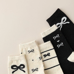 Women's bow-knot knit socks with colorful speckle yarn in black and beige colors