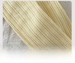 Detail of reinforced sock heel with ribbed knit texture in beige cotton fabric