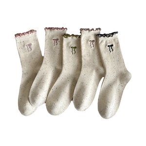 5-pack of beige mid-calf socks with colorful confetti knit and bow embroidery detailing