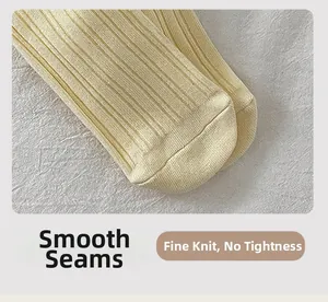 Detailed macro view showing the flat seam toe and fine knit texture of the cotton sock