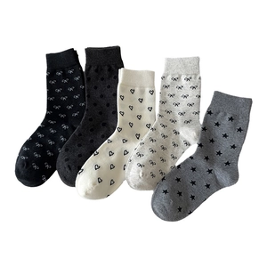 Five pairs of Korean style mid-tube cotton socks with heart and bow patterns in grayscale
