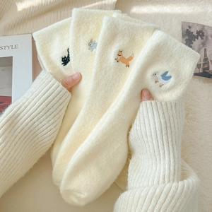 Thick warm winter socks in off-white with cute animal embroidery and plush texture