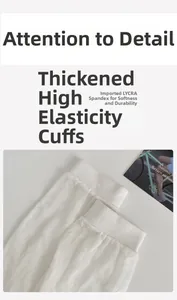 Detail of thickened elastic ribbed cuff on white leg warmers with Lycra spandex material
