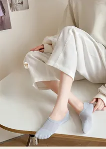 Close-up of light gray invisible sock featuring breathable mesh knit and combed cotton