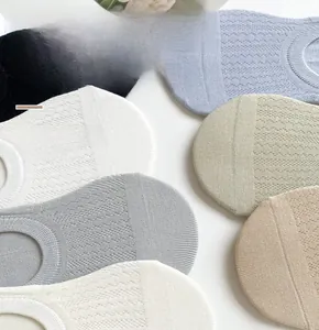 Close-up of breathable mesh texture on combed cotton invisible socks in various colors