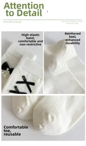 Detailed view of elastic cuffs, reinforced heels and smooth toes on white bow socks