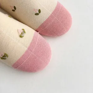 Cream and pink low cut floral cotton socks for women featuring a seamless toe design