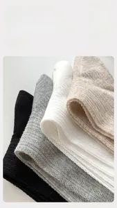 Detail of knit mesh socks showing 200 percent stretch and high elasticity fabric
