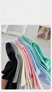 Detail of high-elastic cotton socks in pastel colors with 200% stretch performance
