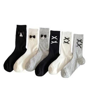 Mid-calf cotton socks set in black and white with cute bow knots and pearl accents