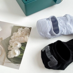 Breathable low cut invisible socks for women with non-slip silicone heel grip in black and blue