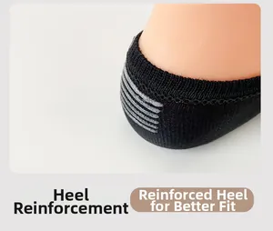 Close-up of black low cut liner socks featuring five gray silicone anti-slip heel grips