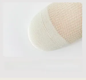 Macro detail of seamless toe stitching and fine knit texture on no-show socks