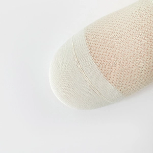 Beige invisible boat socks with breathable mesh knit design and reinforced toe detail