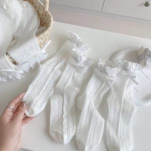 White lace mesh socks with frilly ruffles and sweet satin bows for women