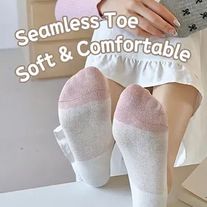 Women's pink and white cotton socks featuring comfortable seamless toe stitching