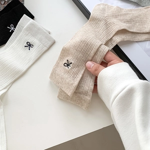 Japanese style slouch socks with bow embroidery and ribbed texture in multiple colors