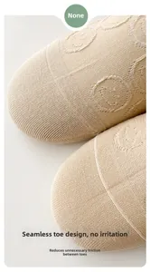 Detail of seamless toe and knit texture with smiley face pattern for no-rubbing comfort