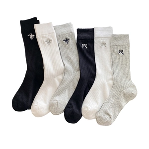 Ribbed knit mid-calf socks set in black, white and grey with bee and bow embroidery