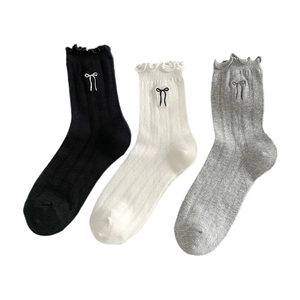 Women's cotton crew socks with bow embroidery and ruffle edges in black white and grey colors