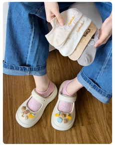 Detailed view of women cotton no-show socks featuring smile embroidery and non-slip design