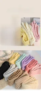 Macro shot of fluffy winter plush socks showcasing soft texture and durable knit fabric