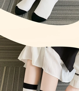 Detail view of Japanese JK style ribbed over-the-knee socks with black toe and white body