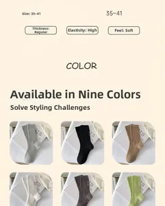 Close-up of ribbed cotton crew socks in multiple colors showing texture and soft material