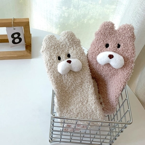 Coral fleece socks with 3D cartoon bear designs in beige and pink for winter warmth