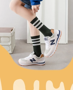 Detail showing vintage cotton striped socks paired with classic suede sneakers