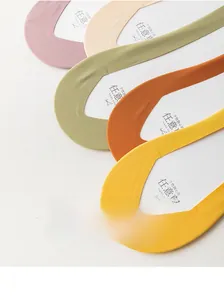 Detail of five colored seamless no-show socks with non-slip silicone and clean cut edges