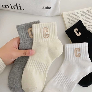 Set of cotton crew socks with embroidered C letter in grey, beige, black, and white