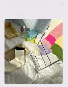 Close-up of assorted colorful ribbed cotton socks in vibrant pastel candy tones