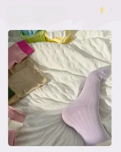 Detail of colorful cotton crew socks showing ribbed texture and stylish mixed candy colors