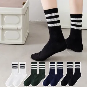 Breathable striped cotton crew socks in multiple colors with classic three-stripe design