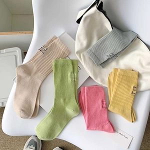 Pack of five ribbed cotton crew socks in pastel colors with minimal embroidery detail