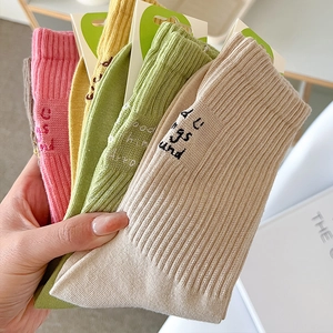 Colorful cotton ribbed crew socks for women with minimalist embroidery in five bright colors