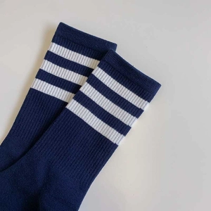Japanese style dark blue ribbed cotton socks with white stripes in a mid-calf length
