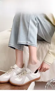 Beige low-cut invisible socks shown with sneakers, focusing on breathable knit texture