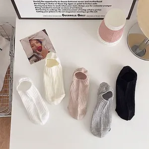 Five pairs of ultra-soft cotton no-show socks in neutral colors with ribbed texture