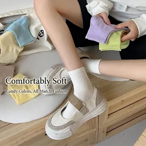 Colorful mid-calf cotton socks in vibrant candy colors with ribbed cuffs for women