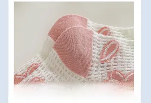 Detail of reinforced heel on breathable pink tulip mesh socks for women