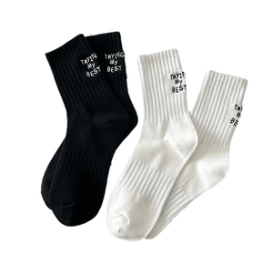 Black and white embroidered mid-calf socks with Tryin My Best lettering and ribbed texture