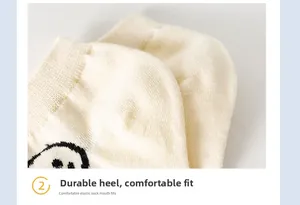 Macro shot of durable cotton sock heel with cartoon smiley face and comfortable texture